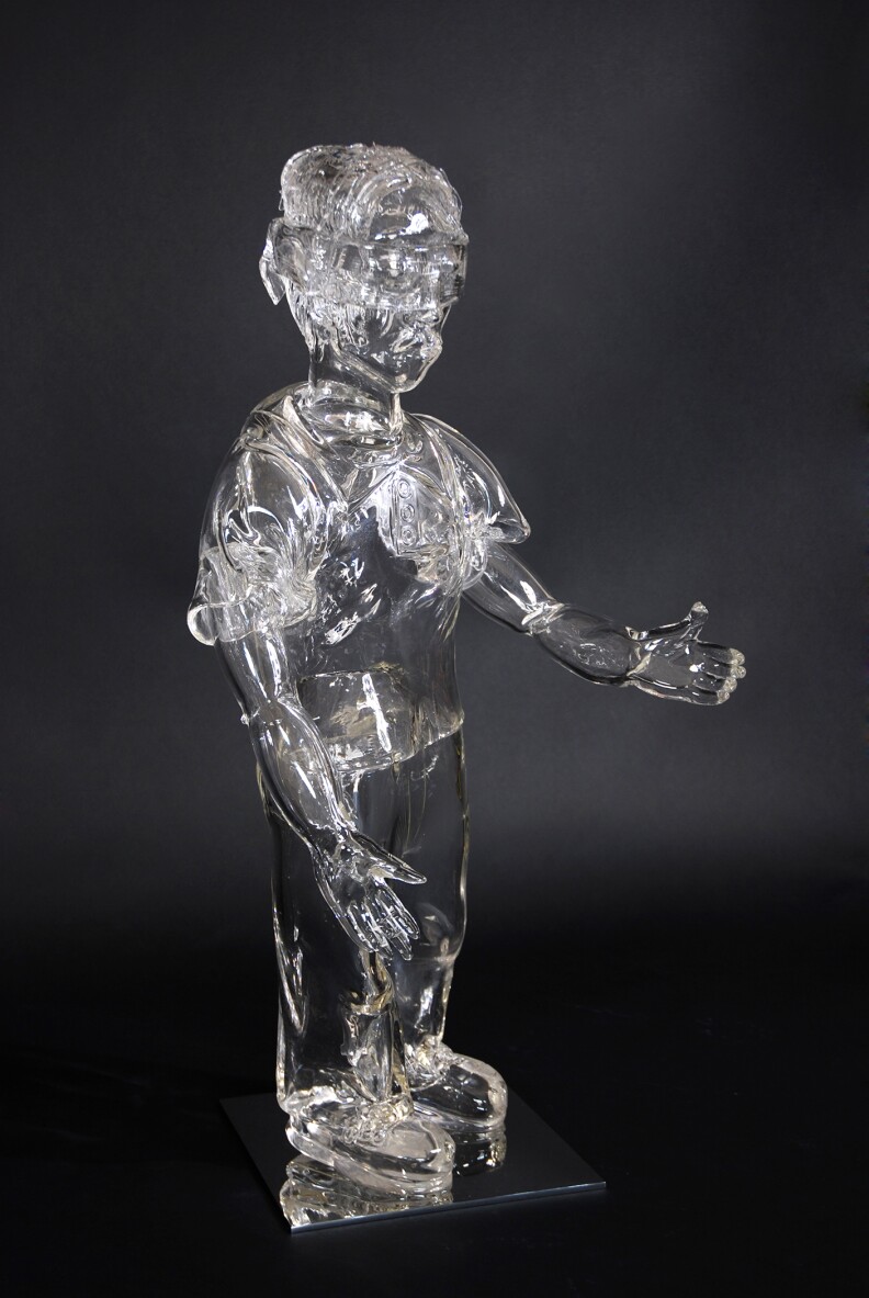 Glass piñata and child from the Broken Dreams installation