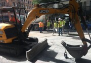 Construction crews work with heavy equipment near Sixth and Spring streets in Downtown L.A.
