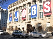 A jobs sign hangs above the entrance to the US Chamber of Commerce building in Washington, DC.