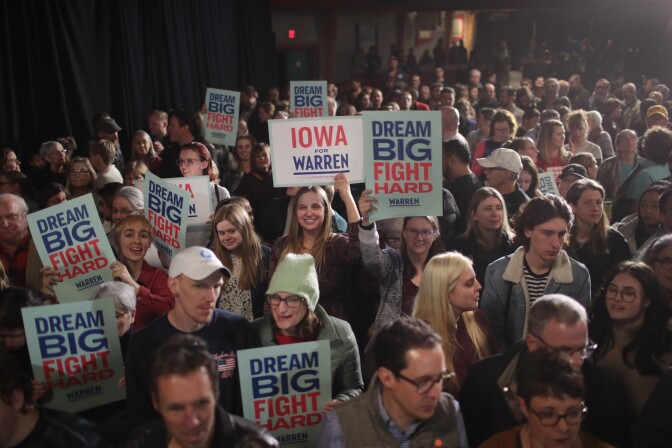 WEST DES MOINES, IOWA - NOVEMBER 25: Guests wait for Democratic presidential candidate Sen. Elizabeth Warren (D-MA) to speak at a campaign stop at the Val Air Ballroom on November 25, 2019 in West Des Moines, Iowa. The 2020 Iowa Democratic caucuses will take place on February 3, 2020, making it the first nominating contest for the Democratic Party in choosing their presidential candidate. (Photo by Scott Olson/Getty Images)