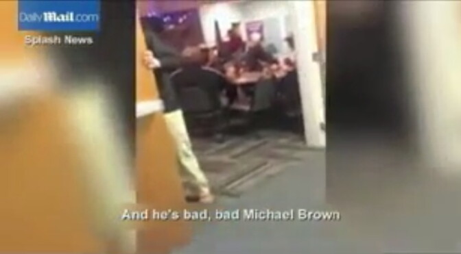 Screenshot from video showing a meeting of retired police officers where a song mocking the death of Michael Brown was performed.