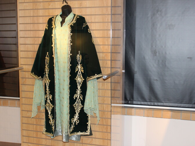 A green two-piece dress from the Deir Ezzor district.