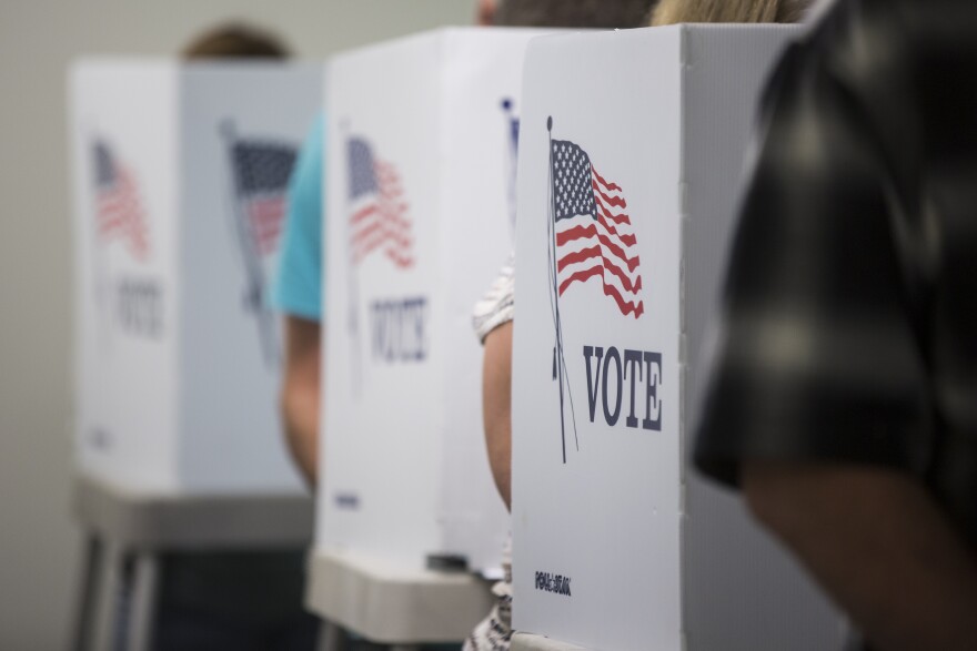 Voters take part in early ballot casting at the Los Angeles County Registrar-Recorder/County Clerk in Norwalk on Wednesday morning, Nov. 2, 2016.