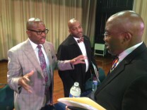 State Assemblyman Mike Gipson, left, and State Senator Isadore Hall, center, talk to Inglewood Unified state administrator Vince Matthews.