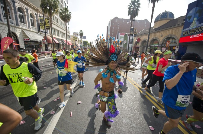 Thousands of participants run down Hollywood boulevard during the annual L.A. Marathon on March 17, 2013 in Hollywood, California. The marathon started at Dodger Stadium and finished at the Santa Monica Pier.