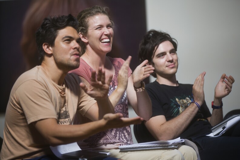 Sebastien Tobler, left, Lesley Webster and Morgan Krantz applaud after a performance of a scene from "Chinatown" during the final day of Joan Scheckel's three-day lab on Sunday, May 3, 2015 at Scheckel's Hollywood studio called "The Space."