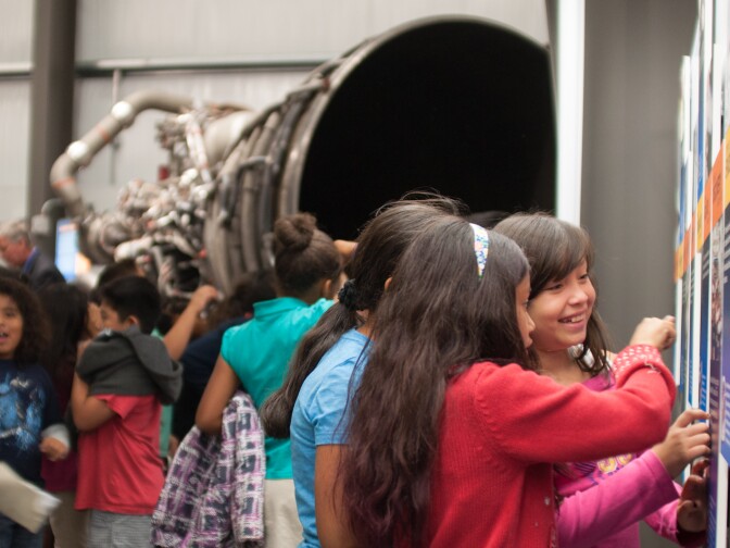 Children in attendance walked around the exibit and explored the different informational signs posted during the grand opening of the exhibition at the California Science Center in Los Angeles, Calif., October 30, 2012.