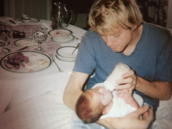 An archival photo of Kurt Cobain with daughter Frances.