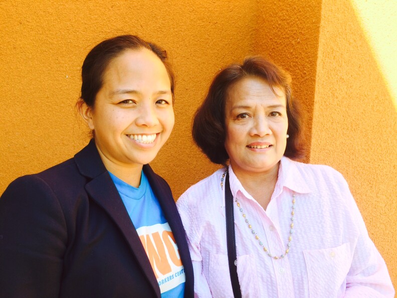 Aquilina Soriano, left, executive director of the Pilipino Workers Center, and Leah Tejada, right, whose family in the Philippines is still feeling the effects from Typhoon Haiyan one year ago.