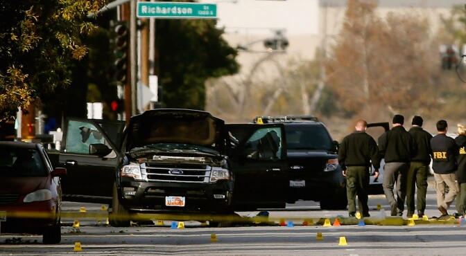 FBI agents and local law enforcement examine the crime scene where suspects of the Inland Regional Center were killed on December 3, 2015 in San Bernardino, California. Police continue to investigate a mass shooting at the Inland Regional Center in San Bernardino that left at least 14 people dead and another 17 injured. 