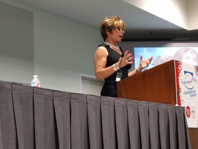 Michaela Mendelsohn, a trans businesswoman, speaks before a seminar at the Western Foodservice and Hospitality Expo at the L.A. Convention Center on August 30, 2016.