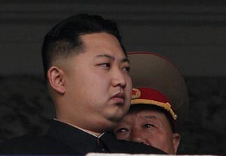 North Korea leader Kim Jong Il's son Kim Jong Un, left, stands with a general during a massive military parade marking the 65th anniversary of the communist nation's ruling Workers Party in Pyongyang, North Korea, on Sunday.
