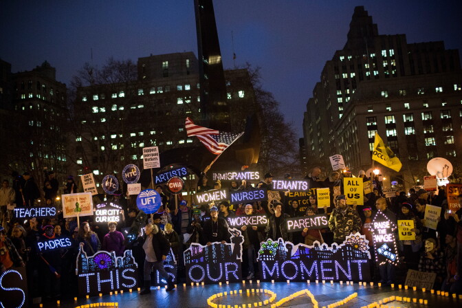 NEW YORK, NY - DECEMBER 05:  Various unions, social causes and organizations attend a rally calling on greater social equality, organized by non-unionized fast food workers demanding for a wage raise from $7.25 per hour to $15.00 per hour and to be unionized on December 5, 2013 in New York, United States.  The day held various protests in front of fast food outlets around the country and culminated in a larger rally attended by various groups in downtown Manhattan.  (Photo by Andrew Burton/Getty Images)
