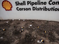 In March, protesters tossed toy guinea pigs at a sign for the Shell Pipeline Company outside their facility in Carson.