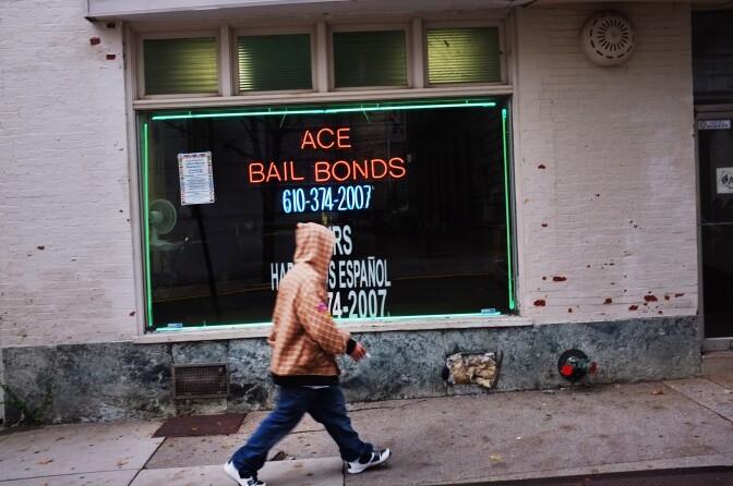 READING, PA - OCTOBER 20:  A man walks by a bail bonds store on October 20, 2011 in Reading, Pennsylvania. Reading, a city that once boasted numerous industries and the nation's largest railroad company, has recently been named America's poorest city with residents over 65,000. According to new census data, 41.3 percent of people live below the poverty line in Reading. Reading has about 90,000 residents, many of whom are recent Hispanic arrivals who have moved from larger eastern cities over the past decade. While a manufacturing base offering well paying jobs still exists in Reading, many companies like Hershey, Stanley Tool and Dana Systems have either moved elsewhere in the United States or to Mexico in search of cheaper labor. The number of people living in poverty in America, 46.2 million, is now at its highest level for the 52 years the Census Bureau has been keeping records.  (Photo by Spencer Platt/Getty Images)
