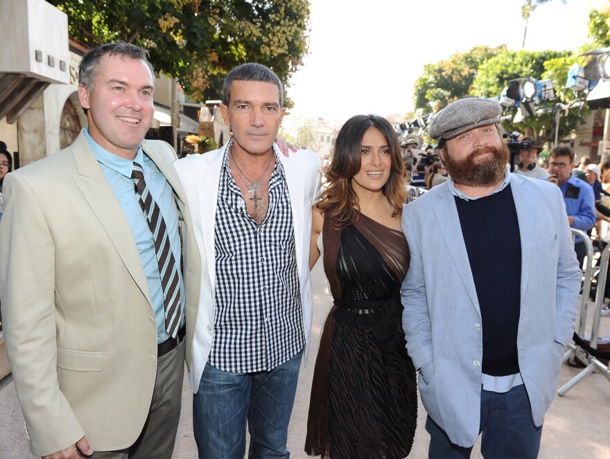 WESTWOOD, CA - OCTOBER 23:  (L-R) Director Chris Miller, actor Antonio Banderas, actress Salma Hayek and actor Zach Galifianakis arrive at the premiere of Dreamworks Animation's "Puss In Boots" at the Regency Westwood Theatre on October 23, 2011 in Westwood, California.  (Photo by Michael Buckner/Getty Images)