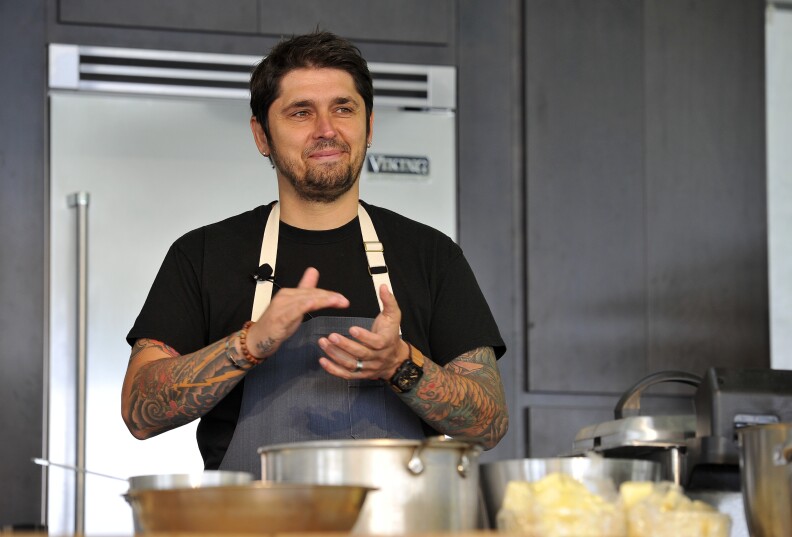 Chef Ludo Lefebvre hosts a cooking demo at Chipotle's "Cultivate San Francisco" a culinary celebration in Golden Gate Park on June 8, 2013 in San Francisco, California. Lefebvre's Trois Mec restaurant was named one of 2013's best new restaurants. 
