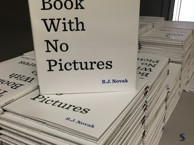 BJ Novak donates copies of his book to students at 52nd Street Elementary School. 