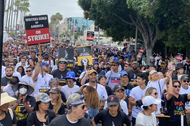 Thousands of people rally in front of Paramount Studios in support of the SAG-AFTRA and WGA strikes. 