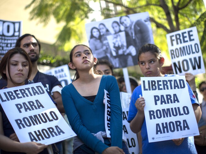 File: Daughters of Romulo Avelica-Gonzalez, Jocelyn, 19, (L) Fatima, 13, and Yuleni, 12, (R), attend a rally for his release outside U.S. Immigration and Customs Enforcement (ICE) offices on March 13, 2017 in Los Angeles.