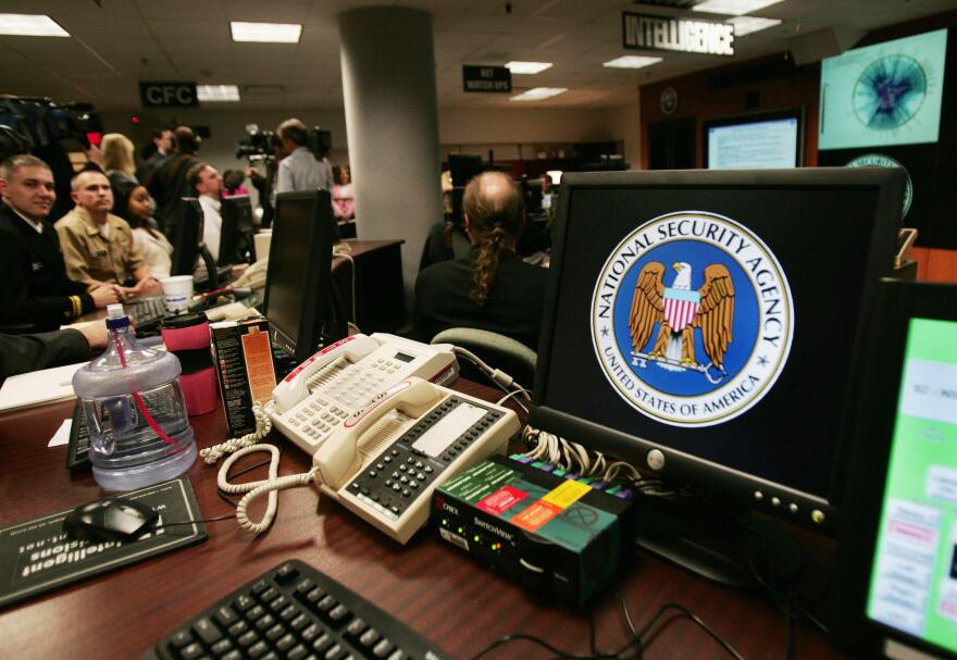 File: A computer workstation bears the National Security Agency (NSA) logo inside the Threat Operations Center inside the Washington suburb of Fort Meade, Maryland, intelligence gathering operation Jan. 25, 2006.