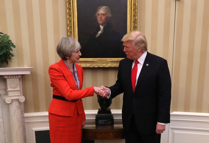 WASHINGTON, DC - JANUARY 27:  British Prime Minister Theresa May shakes hands with U.S. President Donald Trump in The Oval Office at The White House on January 27, 2017 in Washington, DC. British Prime Minister Theresa May is on a two-day visit to the United States and will be the first world leader to meet with President Donald Trump.  (Photo by Christopher Furlong/Getty Images)
