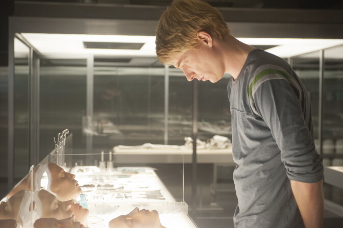 Caleb (Domhnall Gleeson) examines Nathan's A.I. wares in "Ex Machina."