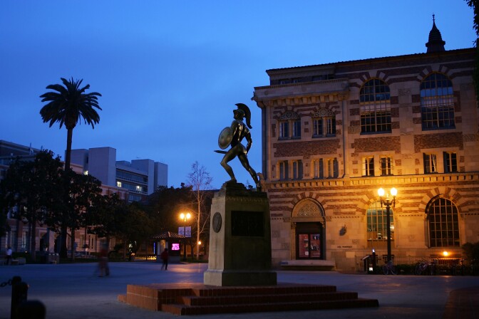 LOS ANGELES, CA - APRIL 06:  A statue of the school mascot, the Trojan, stands on the campus of the University of Southern California (USC) on March 6, 2007 in Los Angeles, California. A growing investigation by New York State Attorney General Andrew M. Cuomo into the relationships between student loan companies and universities reports that financial aid directors at USC, Columbia University, and the University of Texas at Austin allegedly held shares in a student loan company recommended by each university, yielding significant profits for the directors. One of the directors made more than $100,000, according to Cuomo's office.  (Photo by David McNew/Getty Images)