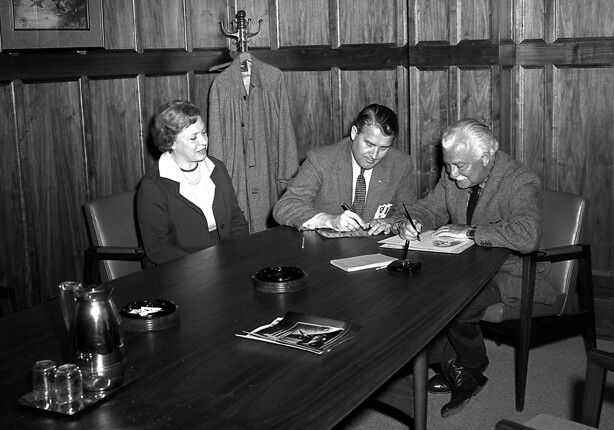 Mr. and Mrs. Arthur Fiedler of the Boston Pops Orchestra and Dr. Wernher von Braun in his office during the Fiedlers' visit to the Marshall Space Flight Center on March 23, 1962.