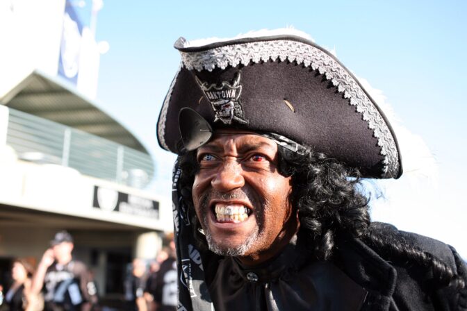 A pirate costumed fan of the Oakland Raiders shows his support prior to the NFL game against the Denver Broncos at McAfee Coliseum in Oakland, California.