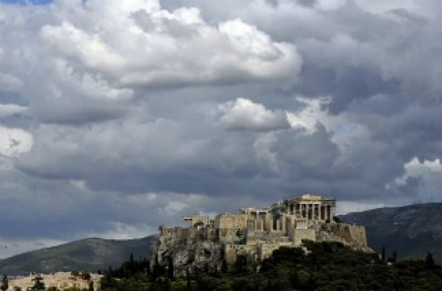 Clouds gather over the Acropolis hill in Athens on September 21, 2011.