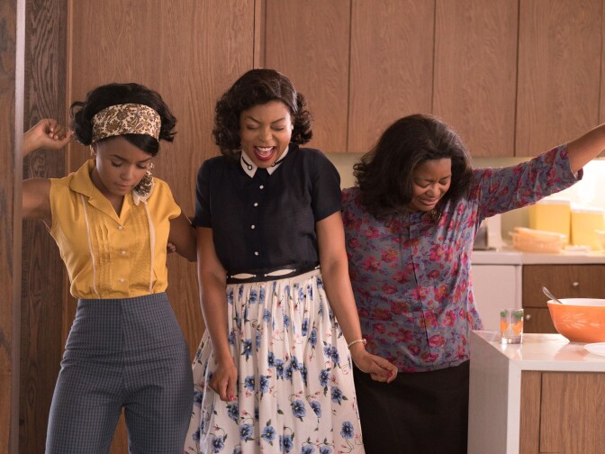 Mary Jackson (Janelle Monae, left), Katherine Johnson (Taraji P. Henson) and Dorothy Vaughan (Octavia Spencer) celebrate their stunning achievements in "Hidden Figures."