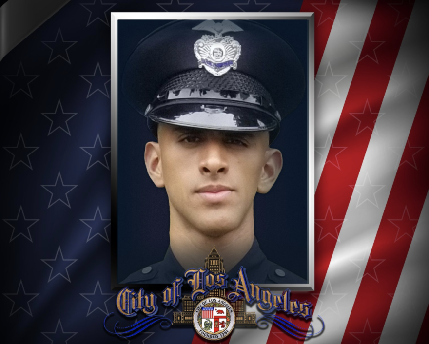 The photo of a young man in a formal police cap sits amid an American flag graphic and the City of Los Angeles seal.