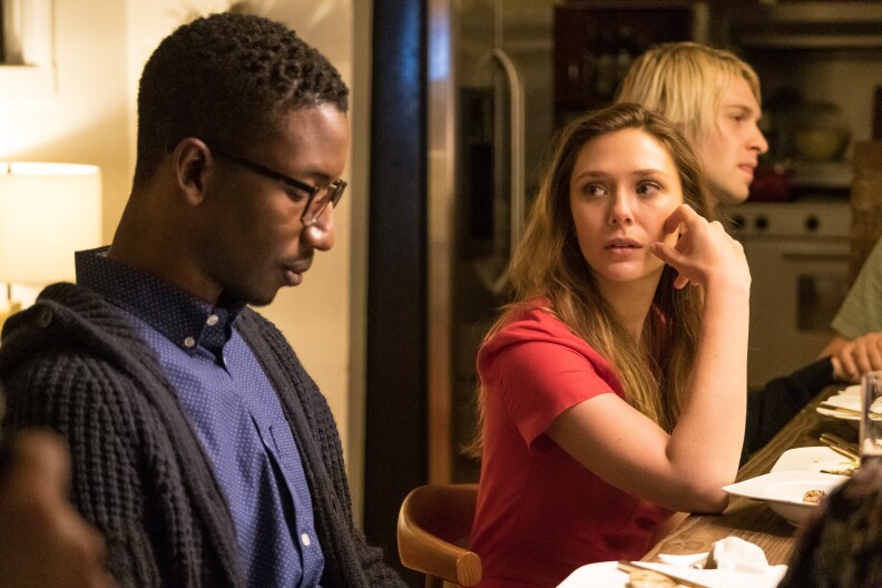 Mamoudou Athie and Elizabeth Olsen in a scene from the Facebook Watch series, "Sorry For Your Loss."