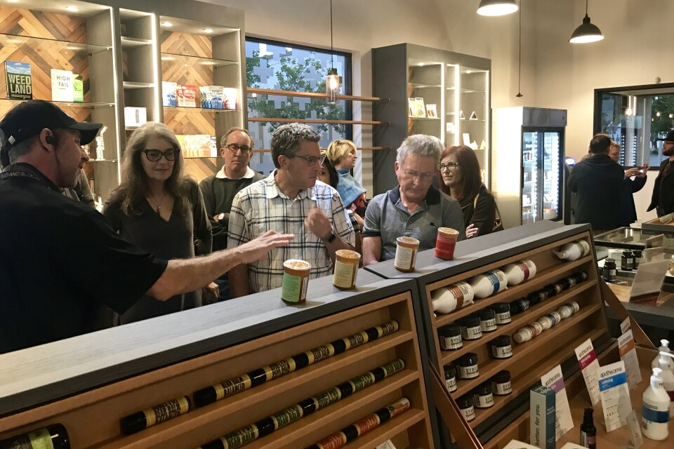 Visitors get a tour of the Bud and Bloom medical marijuana dispensary in Santa Ana, May 5, 2017. 