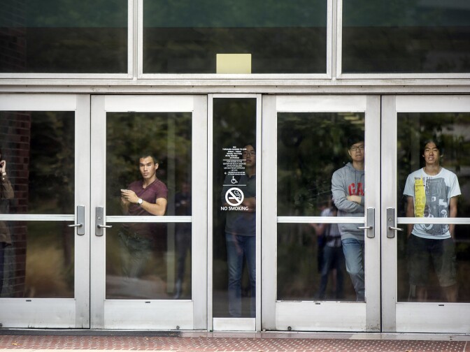 People inside remain sheltered in place on Wednesday, June 1, 2016 following a murder-suicide on the University of California, Los Angeles campus.