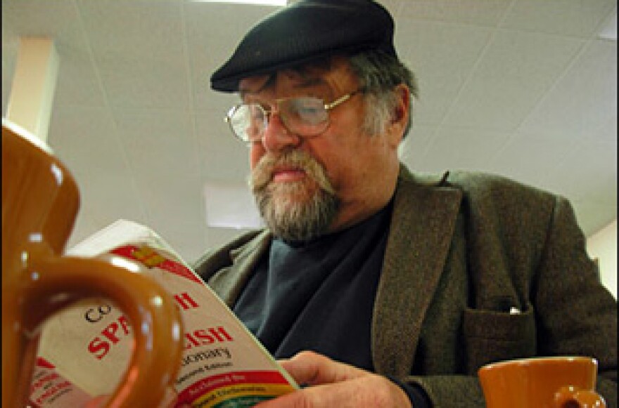 Off-Ramp literary commentator Marc Haefele, who is also an Argentinaphile, studies up during breakfast at Philippe's.