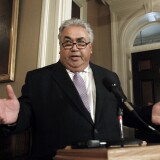 FILE - In this Monday June 10, 2013, file photo State Sen. Ron Calderon, D-Montebello, left, holds a brief news conference during first appearance at the Capitol since the FBI investigators raided his offices in Sacramento, Calif. Sen. Calderon was a no-show with an unexcused absence after at least a half-dozen FBI agents carted boxes from his Sacramento offices following a more than six-hour search in June 2013. Sen. Calderon did not answer any questions and no details have been given for the search and no charges have been filed. (AP Photo/Rich Pedroncelli, File)