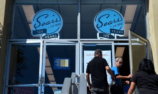 People enter a Sears store in the Boyle Heights neighborhood of Los Angeles, California on October 15, 2018. - Sears, an anchor of retail life for generations of Americans, filed for bankruptcy October 15, 2018 and said it was closing almost 150 stores, the latest marquee victim of the online era. Founded in 1886 as a mail order catalog company, it went on to pioneer departmental stores that sold all things to all people and by the mid-twentieth century had built a vast empire that stretched across North America. (Photo by Frederic J. BROWN / AFP)        (Photo credit should read FREDERIC J. BROWN/AFP via Getty Images)