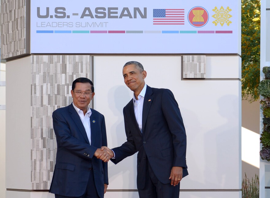 President Barack Obama greets Cambodia's Prime Minister Hun Sen (L) upon arrival at Sunnylands estate for a meeting of the Association of Southeast Asian Nations (ASEAN) on Feb. 15, 2016 in Rancho Mirage, California.