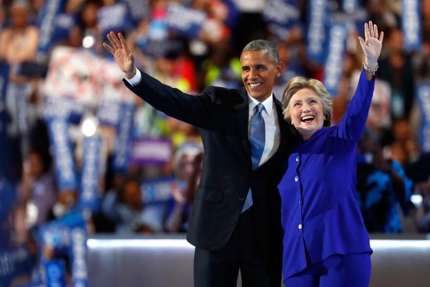 PHILADELPHIA, PA - JULY 27:  US President Barack Obama and Democratic Presidential nominee Hillary Clinton wave to the crowd on the third day of the Democratic National Convention at the Wells Fargo Center, July 27, 2016 in Philadelphia, Pennsylvania. Democratic presidential candidate Hillary Clinton received the number of votes needed to secure the party's nomination. An estimated 50,000 people are expected in Philadelphia, including hundreds of protesters and members of the media. The four-day Democratic National Convention kicked off July 25.  (Photo by Aaron P. Bernstein/Getty Images)