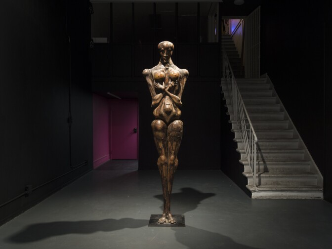 Maxine Kim Stussy: The Watcher, 1980, wood assemblage, height: 89 in.; metal base: 18 x 18 in. At "The Human Beast: Art of Maxine Kim Stussy & Jan Stussy," at WUHO (6518 Hollywood Blvd., Los Angeles, CA 90028) through February 9.