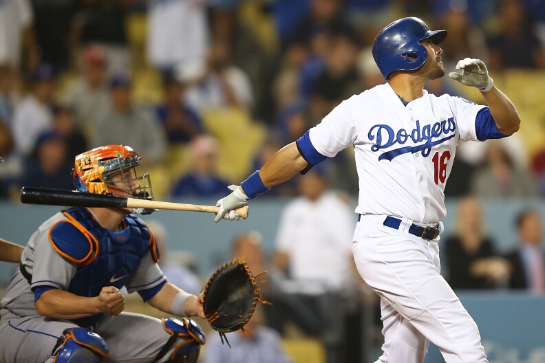 Andre Ethier #16 of the Los Angeles Dodgers hits a two run home run in the ninth inning to tie the game against the New York Mets at Dodger Stadium on August 14, 2013 in Los Angeles, California. 