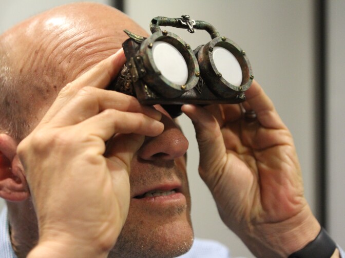 The Frame host John Horn with a vintage slide viewer used to pitch "The Little Prince."