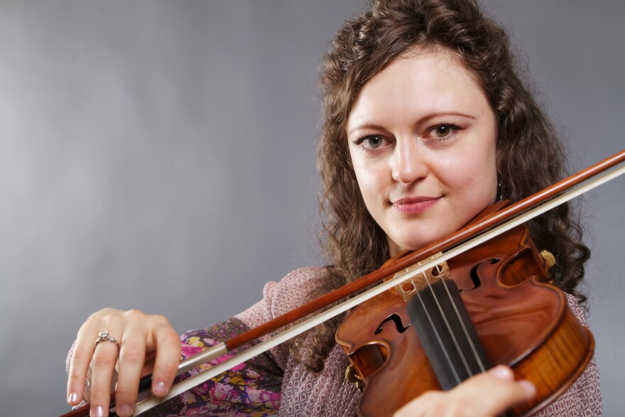 UC Irvine violinist Iryna Krechkovsky with a 1689 Baumgartner Stradivari, valued at $5 million.
 