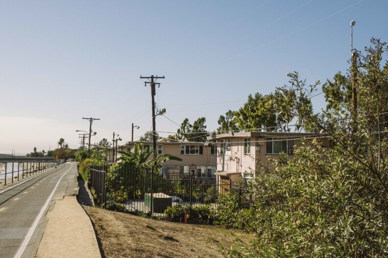 Many of the 62 apartment buildings that make up the Mar Vista Gardens community overlook the Ballona Creek Bike Path.