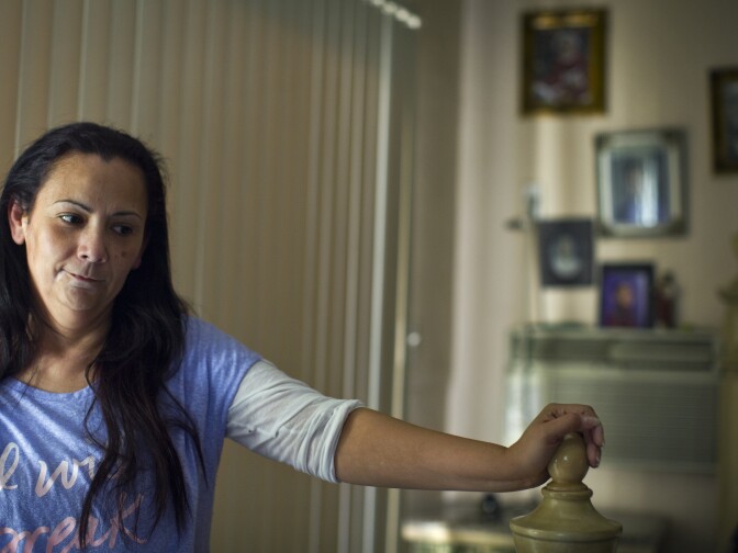 Raymond Zambrano's mother Faviola Morelos stands in her Panorama City home. "I always tell him he can do anything he wants," said Morelos, who is a mother of five.