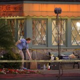 SEAL BEACH, CA - OCTOBER 12:  Investigators collect evidence at Salon Meritage hair salon where a man shot nine people, killing eight of them, on October 12, 2011 in Seal Beach, California. The shooting is being reported as the worst mass killing in Orange County history. (Photo by David McNew/Getty Images)