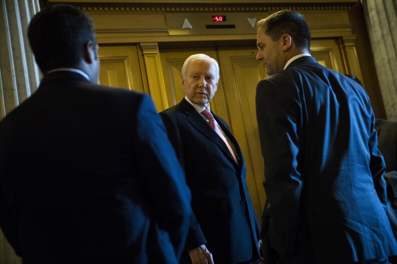 Sen. Orrin Hatch (R-UT) talks with reporters on Capitol Hill, May 31, 2015 in Washington, DC. The National Security Agency's authority to collect bulk telephone data is set to expire June 1, unless the Senate can come to an agreement to extend the surveillance programs. 