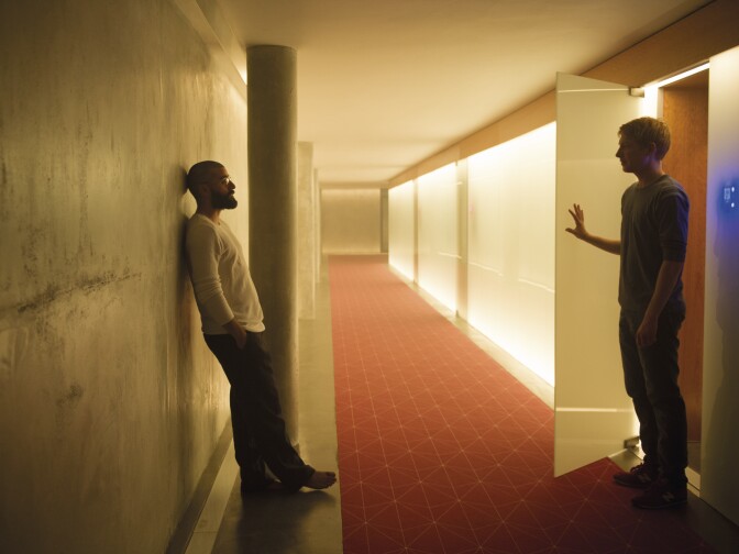 Oscar Isaac as Nathan and Domhnall Gleeson as Caleb in "Ex Machina."